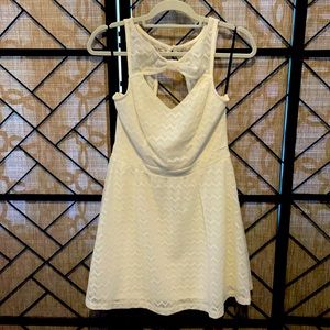 Material Girl beige cut out front/back dress. Size large. Brand new.
